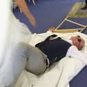 Anthony Diver after he was 'choke slammed' through the table