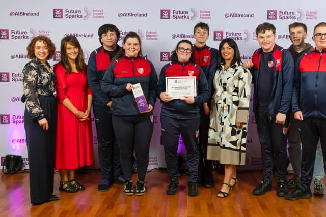 AIB Chief Marketing Officer Elaine Purcell with Teegan McCue, Jessica McNally, Dermot Connolly, Margaret Greene, Alton Deeney and Lee Laird of St Bernadette's. Photo: INPHO/Nick Elliott