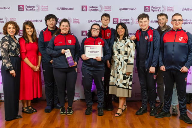 AIB Chief Marketing Officer Elaine Purcell with Teegan McCue, Jessica McNally, Dermot Connolly, Margaret Greene, Alton Deeney and Lee Laird of St Bernadette's. Photo: INPHO/Nick Elliott