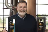 James Doherty with the very first bottles off the line for the second release of Ardara Single Malt