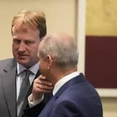 Justice Minister Jim O’Callaghan speaking to Taoiseach and Fianna Fáil leader Micheál Martin