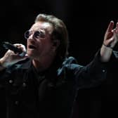 Bono performing on stage